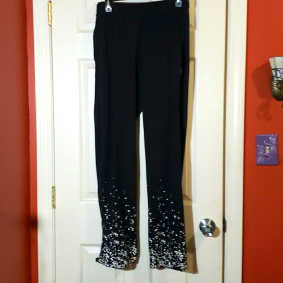 Zumba Fitness Pants & Jumpsuits Zumba Black Stretch Pants W White Design On Bottom Of Leg